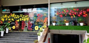 Vẽ tranh kính tết hoa đào hoa mai ngân hàng Agribank